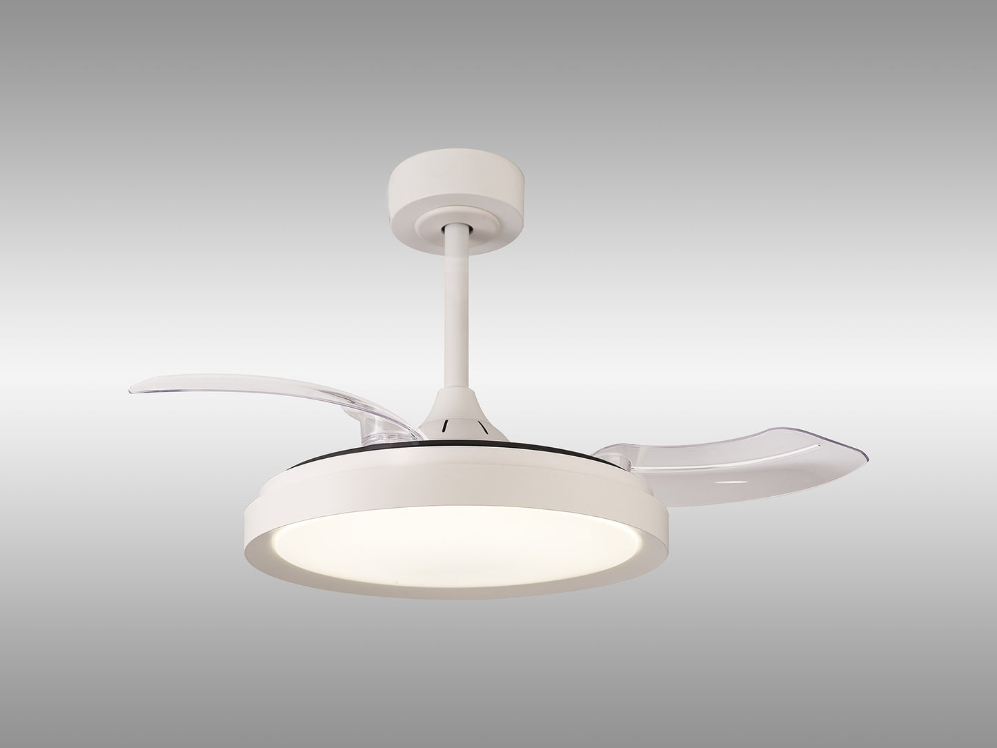 The Mistral Mini White Ceiling Fan with Light by Ceiling Fans UK features a modern design with a built-in, circular 40W dimmable LED light. It has two transparent blades that extend outward and includes a remote control for convenience. The unit is mounted using a cylindrical ceiling fixture against a simple light gray gradient background, and it comes with a 5-year warranty.