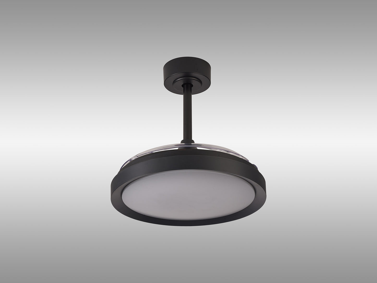 The Mistral Mini Black Ceiling Fan with Light from Ceiling Fans UK features a modern ceiling light fixture with a circular, black frame and frosted glass covering. Hanging from a short rod attached to the ceiling, this dimmable 40W LED light includes a built-in 28W DC fan. Conveniently adjustable with a remote control, it also comes with a 5-year warranty. The background is plain grey.