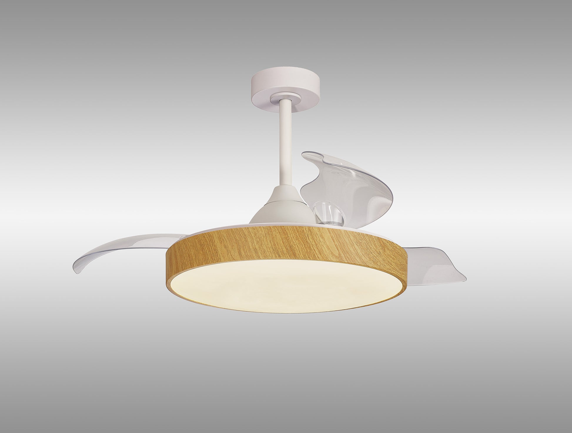 The Alaska Madera Wood Ceiling Fan by Ceiling Fans UK features a modern design with a 60W LED dimmable central cylindrical light encased in a wooden ring, complemented by three translucent, curved blades. The fan is suspended from a white rod and base against a plain gray background and includes convenient remote and app controls.