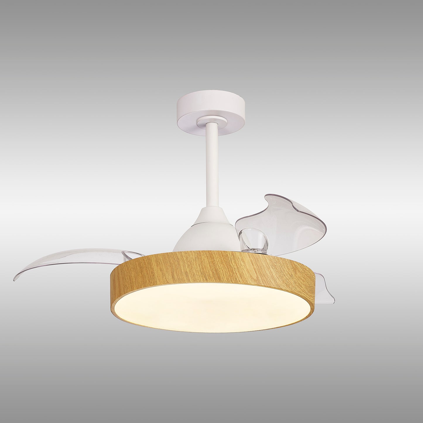 The Alaska Mini White/Wood Ceiling Fan with Light by Ceiling Fans UK features a sleek white support stem and a stylish cylindrical wooden lampshade, complemented by three translucent wing-shaped accents. The 43cm ceiling fan includes a powerful 45W LED dimmable ceiling light with a built-in 25W DC fan, offering the convenience of remote and APP control. It is mounted on a circular base set against a gradient of light to dark grey and comes with a 5-year warranty.