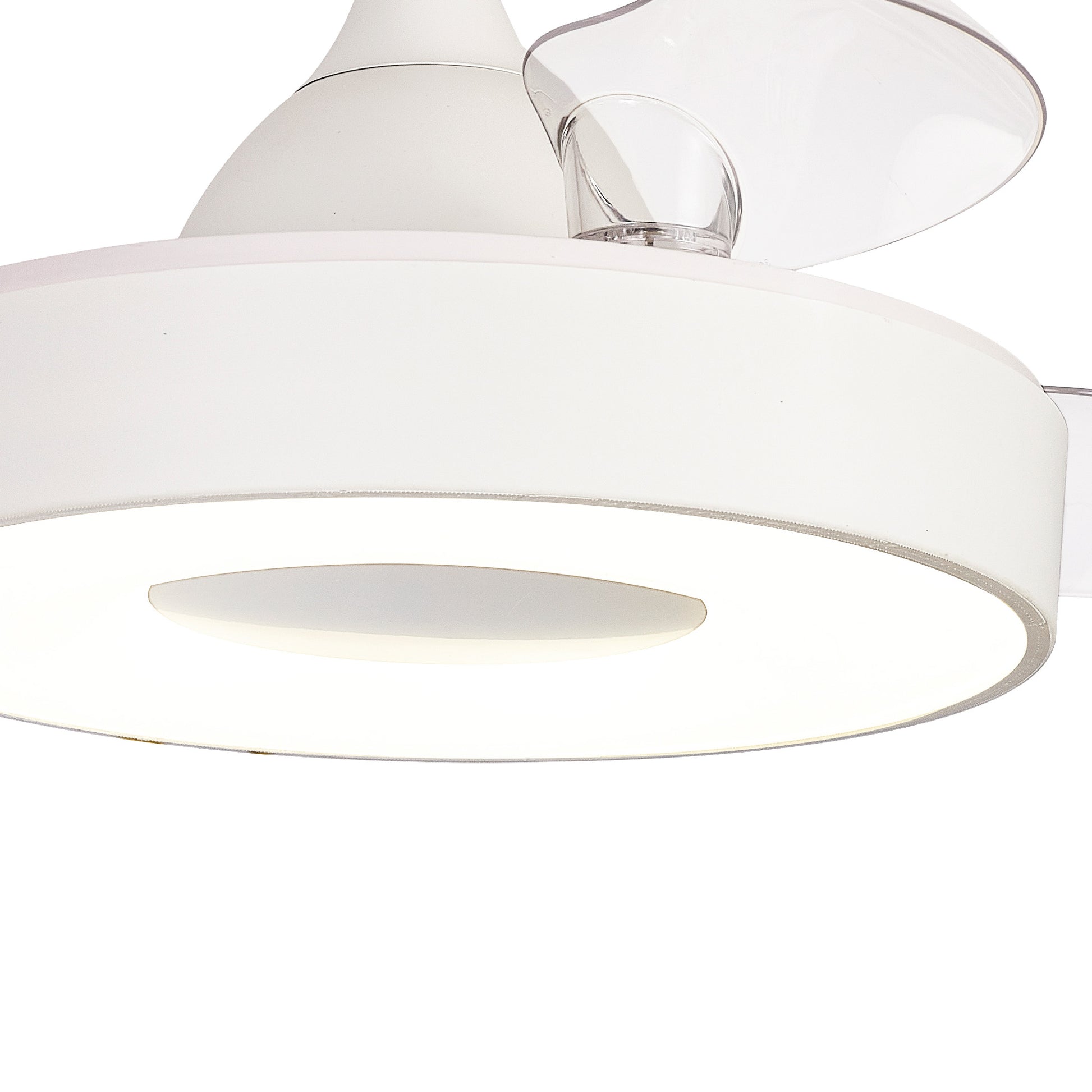 Close-up of the Coin White Ceiling Fan with light by Ceiling Fans UK, featuring a 60W LED dimmable ceiling light and a built-in 30W DC reversible fan. The circular design includes a frosted diffuser for softened light and a small transparent shield on one side. Its sleek and minimalist aesthetic adds a contemporary touch to the decor, further enhanced by remote & app control functionality and backed by a 5-year warranty.