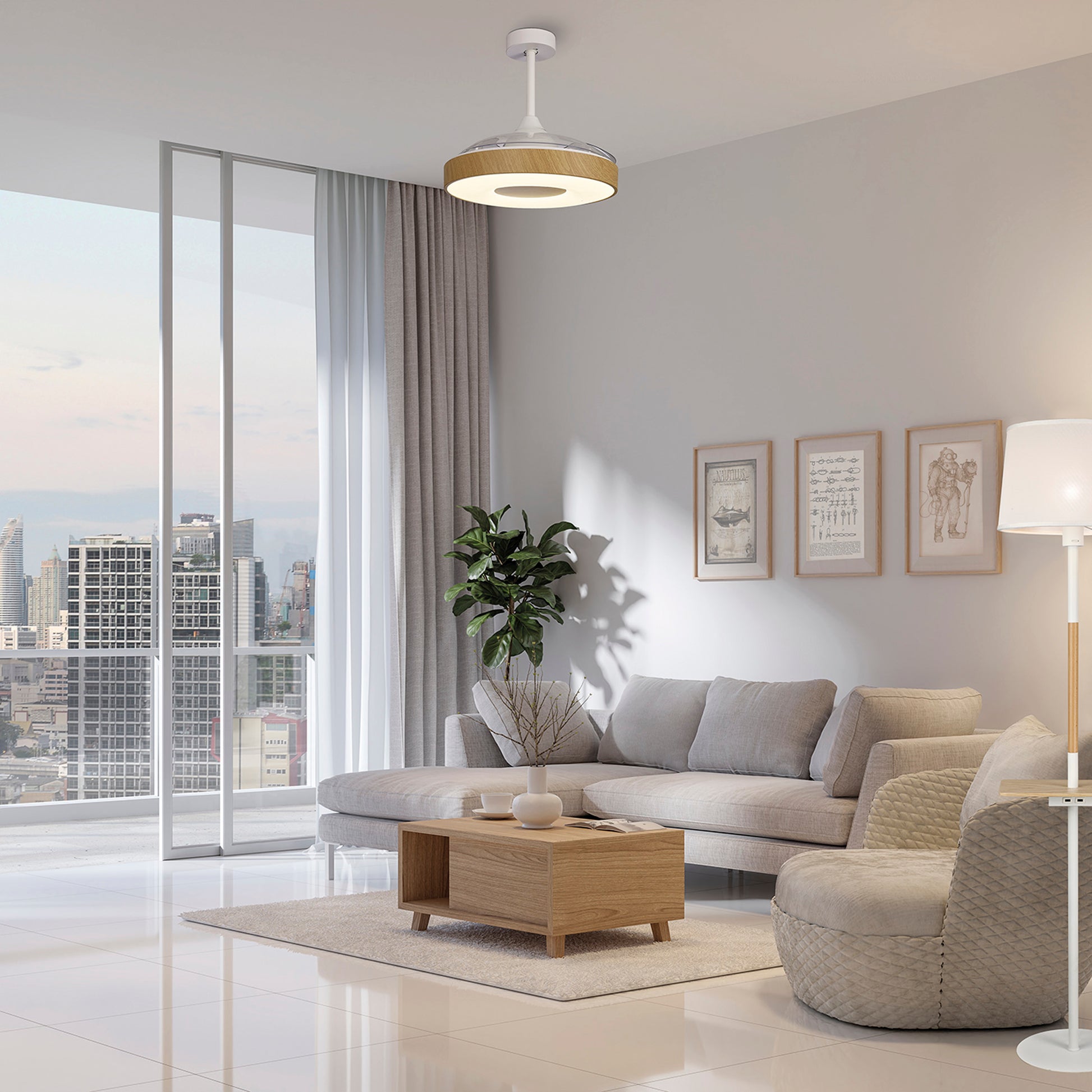 A modern living room with a large window offering a city view. The room features a beige sectional sofa, a wooden coffee table, a potted plant, and framed artwork on the wall. Adorned with minimalist decor, the space is illuminated by an elegant Coin Mini White/Wood Ceiling Fan with Light 45W LED Dimmable Ceiling Light With Built-In 25W DC Reversible Fan from Ceiling Fans UK and an adjustable floor lamp.