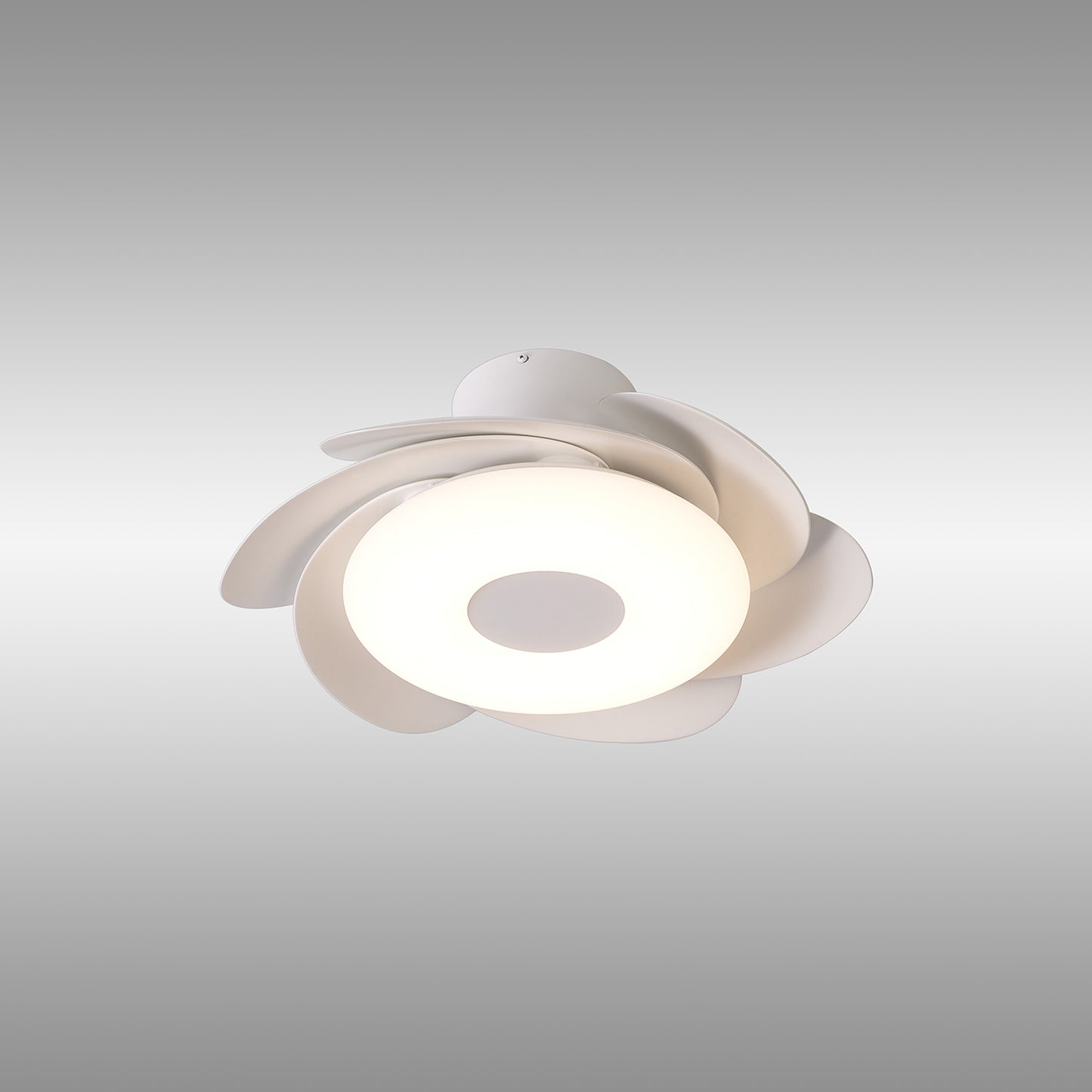 The Flower White Ceiling Fan with Light by Ceiling Fans UK features a modern design with a central circular 24W dimmable LED light source and petal-like white shades arranged in a floral pattern. It also includes a 25W built-in reversible DC fan and comes with remote control. The background is a plain gradient from light grey at the top to white at the bottom.