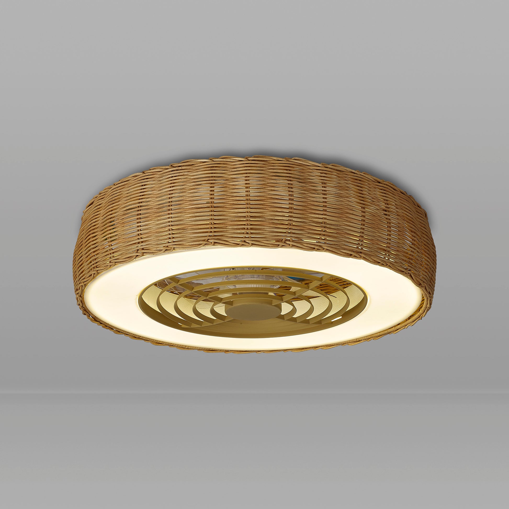 The Ceiling Fans UK Kilimanjaro Mini White Fan features a 58cm beige rattan shade, 55W dimmable 3800lm LED light with an illuminated ring, and a central gold/white fan (25W DC reversible), mounted on a plain gray ceiling.