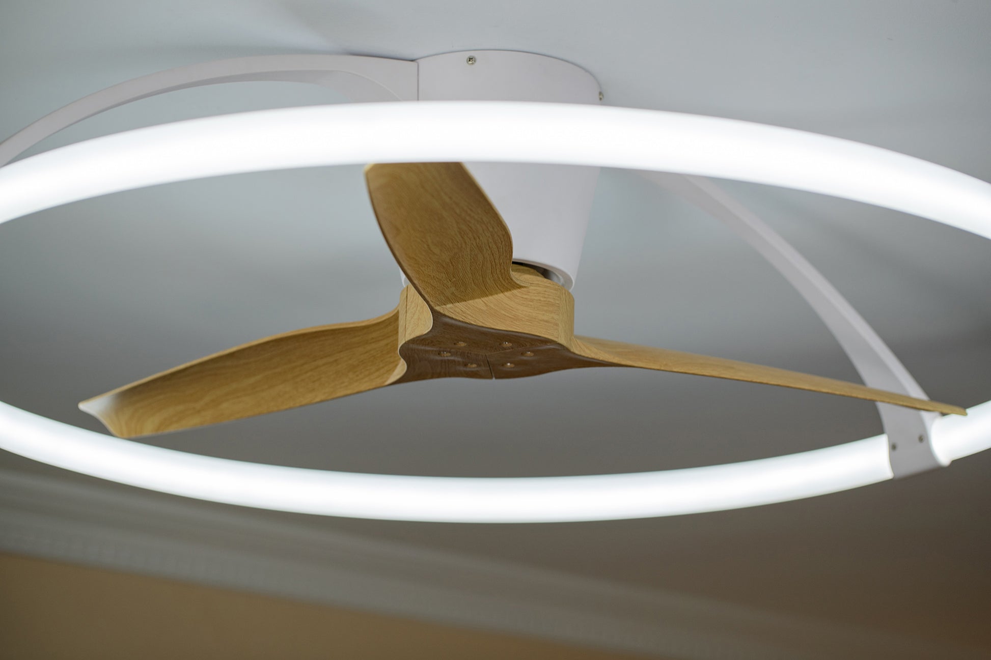 The MANTRA M7533 Nepal Silver/Walnut Ceiling Fan from Ceiling Fans UK features three wooden blades, a 75W dimmable LED light (7200lm), a 35W DC reversible fan, and is controllable via remote, app, Alexa, or Google Voice.