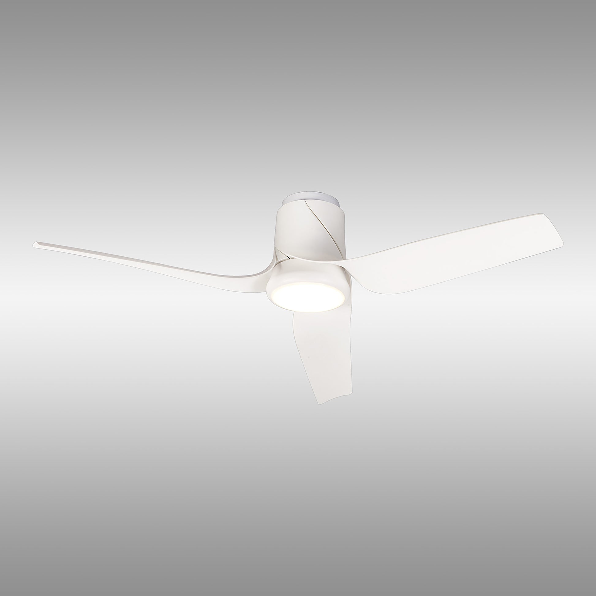 A modern white ceiling fan, the Ushuaia by Ceiling Fans UK, features three sleek and curved blades paired with a 30W integrated dimmable LED light. Set against a plain gradient background, this 133cm fan showcases minimalist design and smooth aerodynamic lines. It also offers ultimate convenience with built-in 35W DC motor and remote APP control.